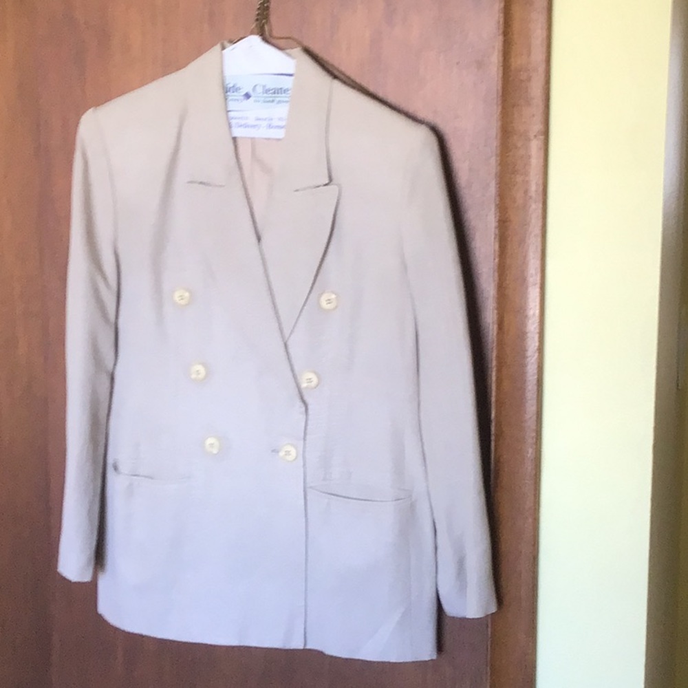 Two piece pants suit.